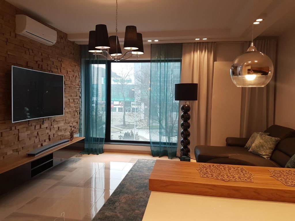 Апартаменты Apartament Deluxe Półwiejska Познань